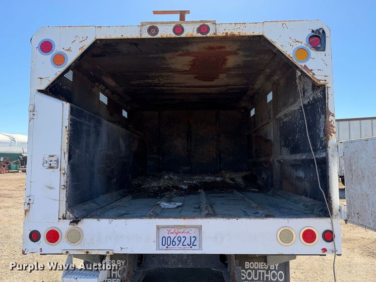 image for item EA0044 2005 GMC C6 chipper truck