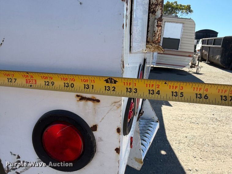 image for item EA0044 2005 GMC C6 chipper truck