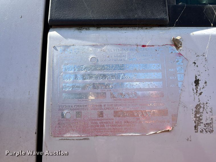 image for item EA0044 2005 GMC C6 chipper truck