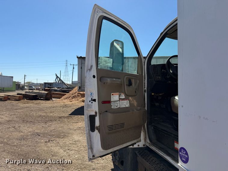 image for item EA0044 2005 GMC C6 chipper truck
