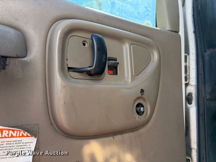 image for item EA0044 2005 GMC C6 chipper truck