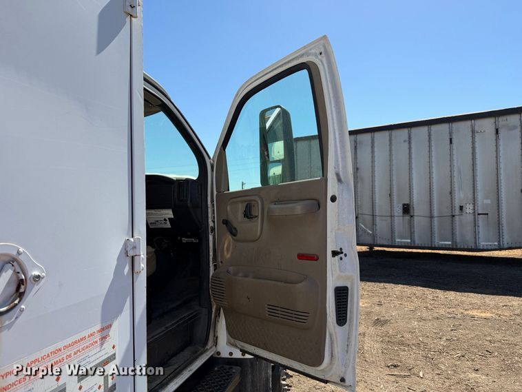 image for item EA0044 2005 GMC C6 chipper truck