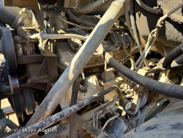 image for item EA0044 2005 GMC C6 chipper truck