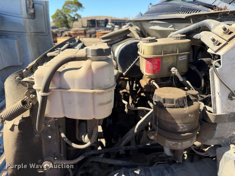 image for item EA0044 2005 GMC C6 chipper truck