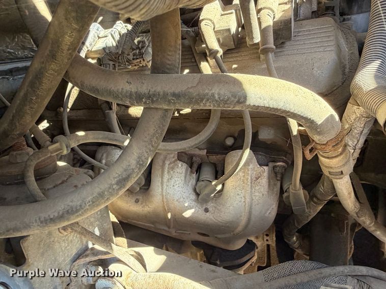 image for item EA0044 2005 GMC C6 chipper truck