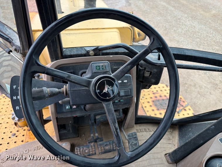 image for item EA0549 1993 John Deere 710D backhoe