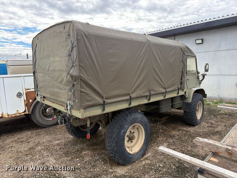 image for item EA0574 1962 Mercedes-Benz Unimog flatbed truck