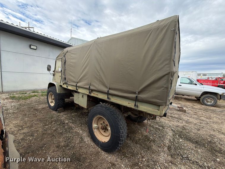 image for item EA0574 1962 Mercedes-Benz Unimog flatbed truck