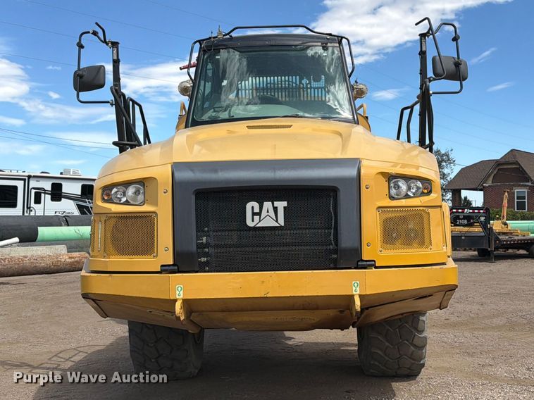 image for item ED0208 2015 Caterpillar 730C water wagon