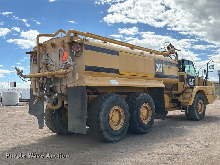 image for item ED0208 2015 Caterpillar 730C water wagon