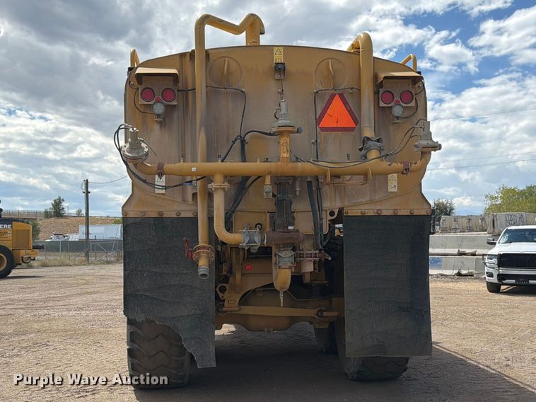 image for item ED0208 2015 Caterpillar 730C water wagon