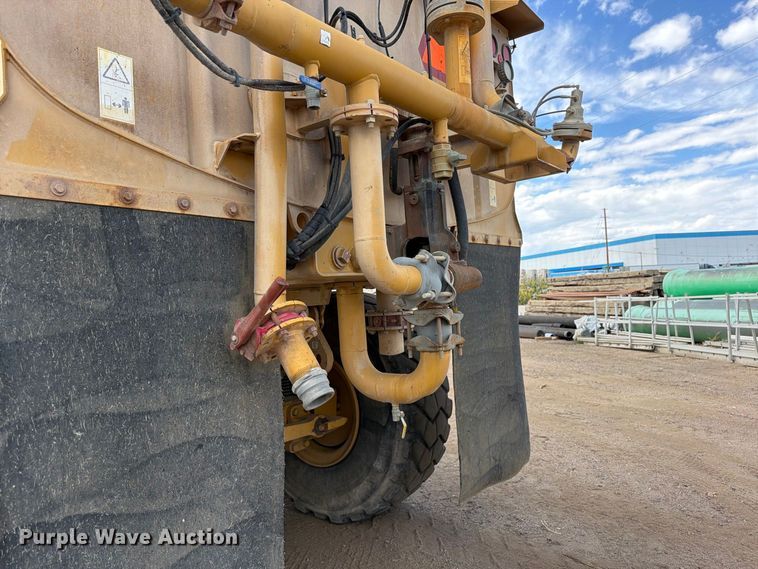 image for item ED0208 2015 Caterpillar 730C water wagon