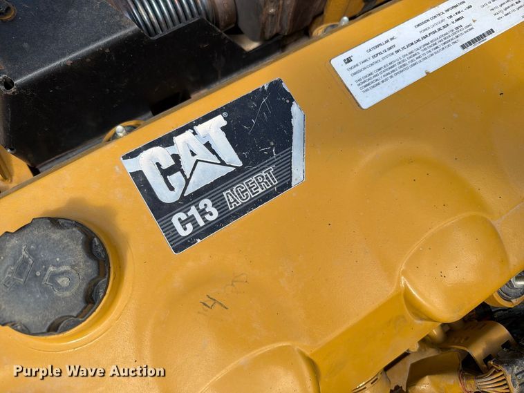 image for item ED0208 2015 Caterpillar 730C water wagon