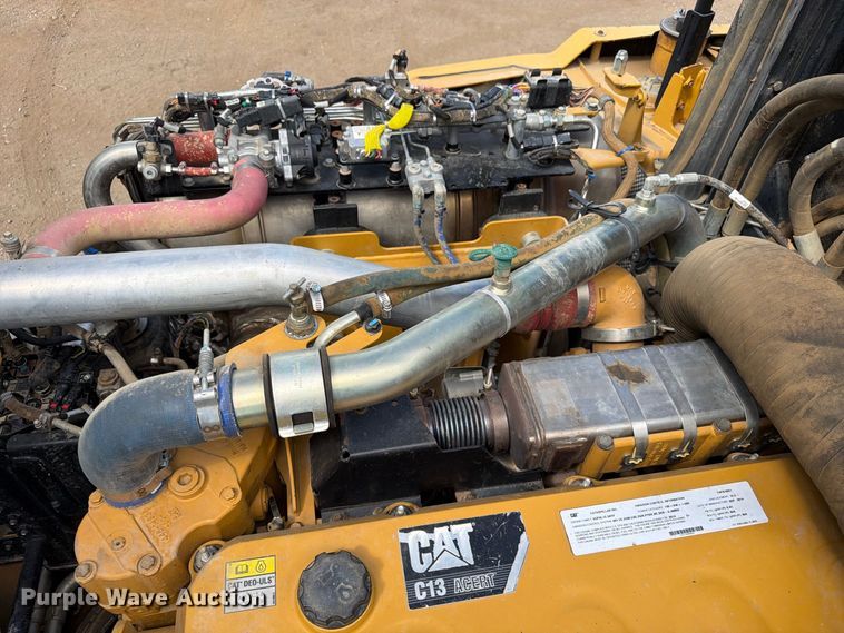 image for item ED0208 2015 Caterpillar 730C water wagon