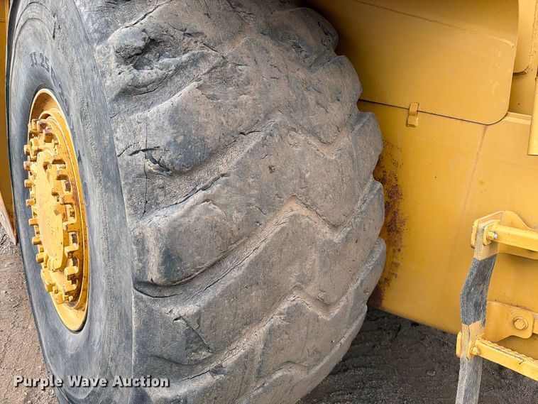 image for item ED0212 2012 Caterpillar 627G conventional scraper 