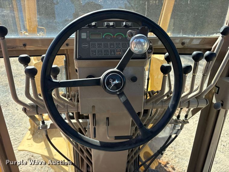 image for item ES8140 1998 John Deere 770CH motor grader