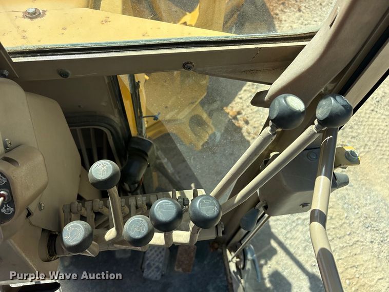 image for item ES8140 1998 John Deere 770CH motor grader
