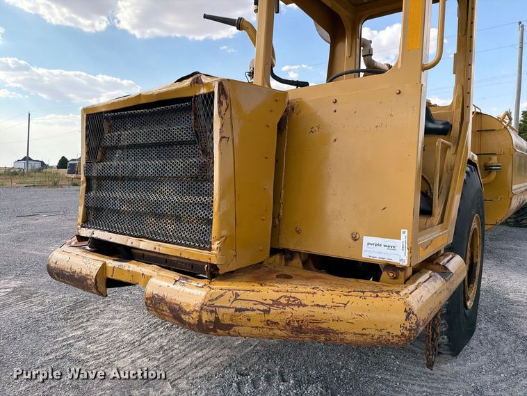 image for item EW8772 Caterpillar 613B water wagon