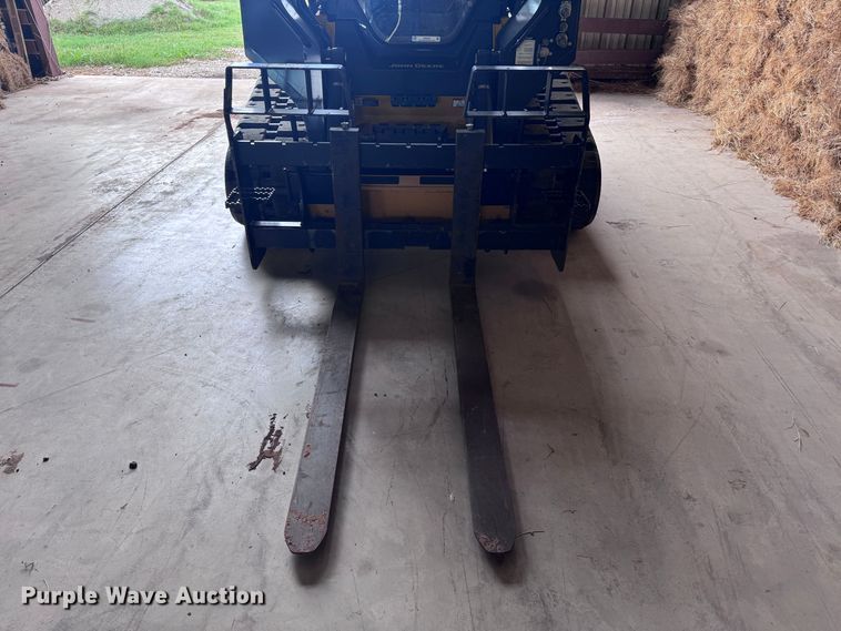 image for item EX0534 John Deere PF60 skid steer forks