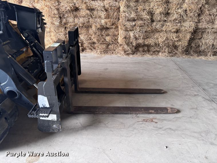 image for item EX0534 John Deere PF60 skid steer forks