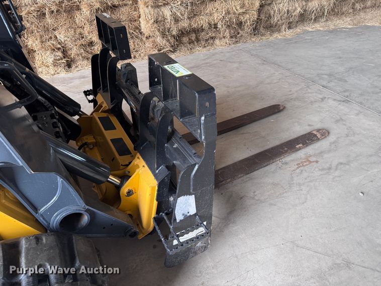image for item EX0534 John Deere PF60 skid steer forks