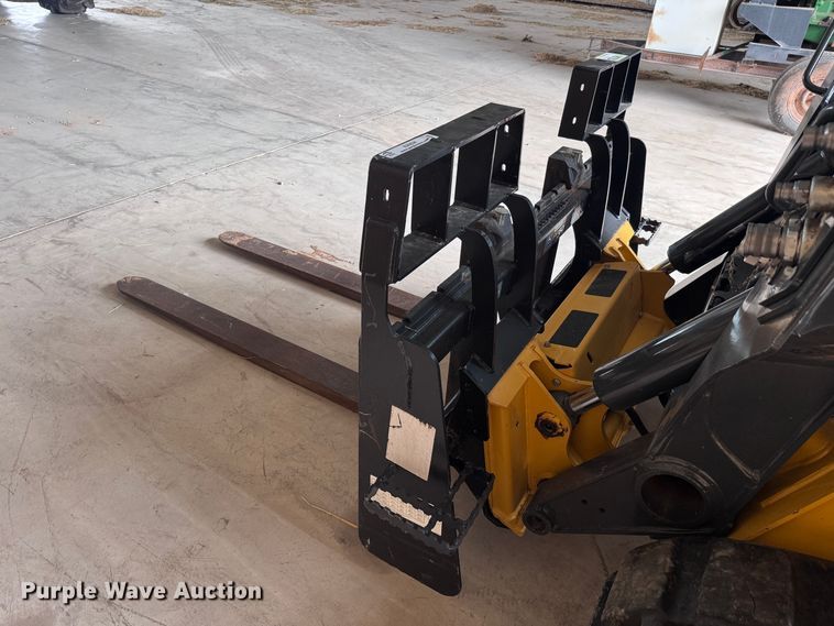 image for item EX0534 John Deere PF60 skid steer forks