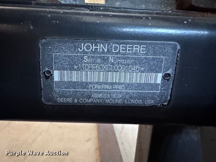 image for item EX0534 John Deere PF60 skid steer forks