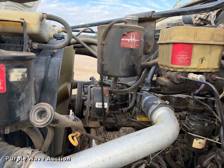 image for item EX2296 1999 Ford F800 flatbed truck
