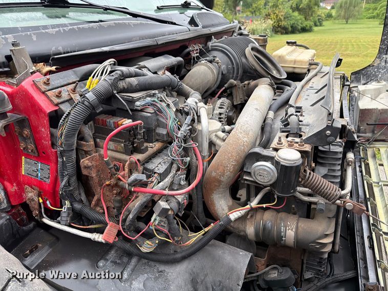 image for item FT6286 2006 GMC C5 dump flatbed truck