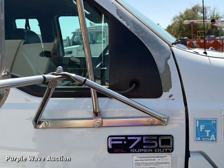 image for item YA3286 2015 Ford F750 Super Duty chipper truck
