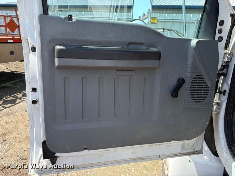image for item YA3286 2015 Ford F750 Super Duty chipper truck