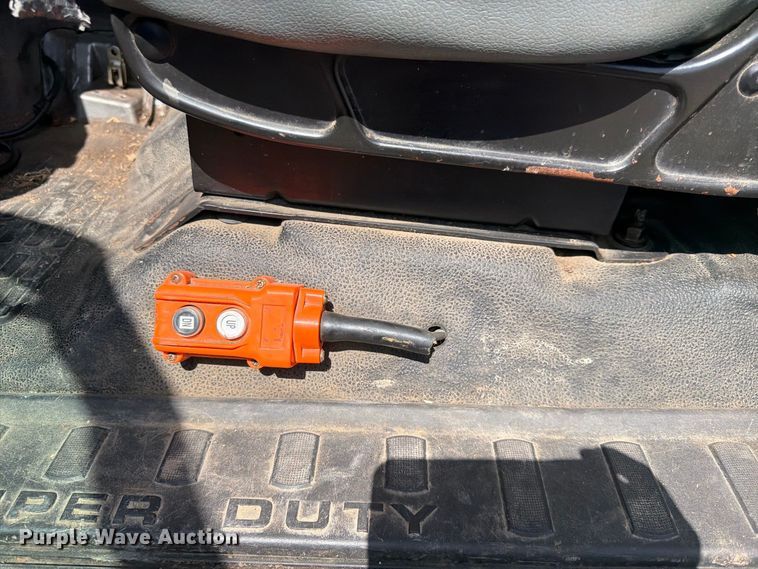 image for item YA3286 2015 Ford F750 Super Duty chipper truck