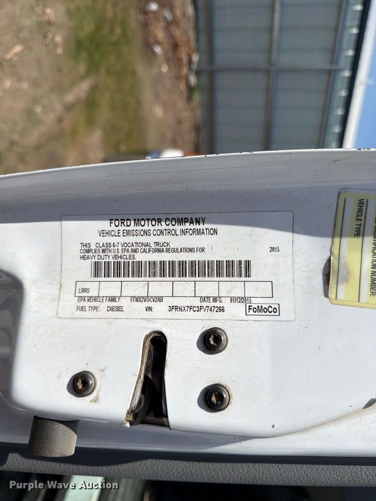 image for item YA3286 2015 Ford F750 Super Duty chipper truck