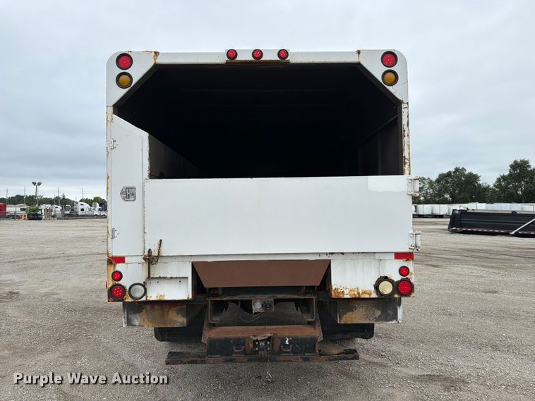 image for item YA3900 2010 Ford F750 Super Duty chipper truck