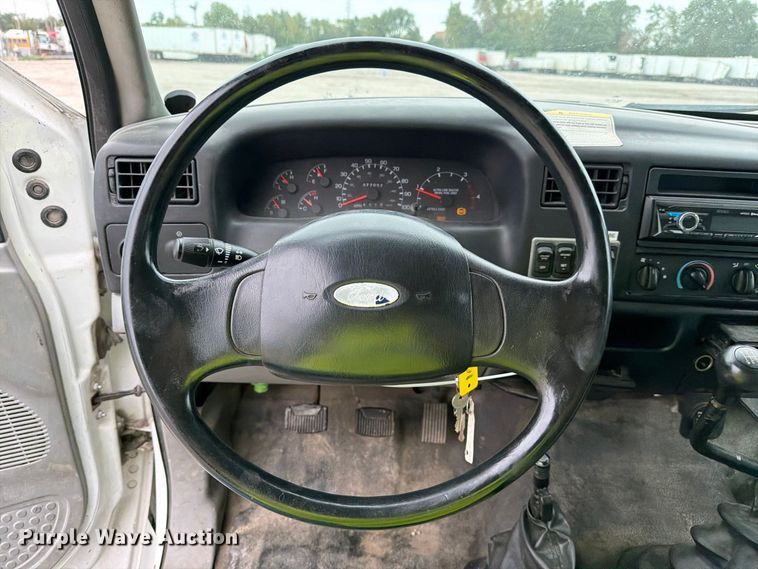 image for item YA3900 2010 Ford F750 Super Duty chipper truck