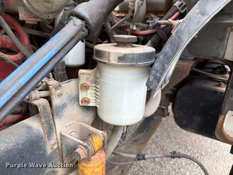 image for item YA3900 2010 Ford F750 Super Duty chipper truck