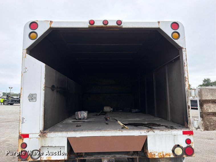 image for item YA3900 2010 Ford F750 Super Duty chipper truck