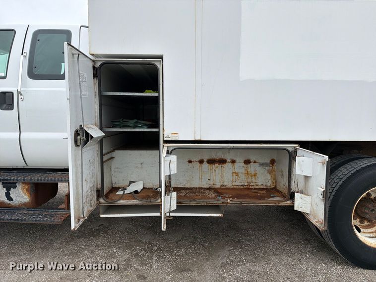 image for item YA3900 2010 Ford F750 Super Duty chipper truck