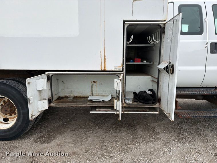 image for item YA3900 2010 Ford F750 Super Duty chipper truck