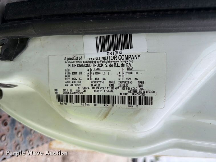 image for item YA3900 2010 Ford F750 Super Duty chipper truck