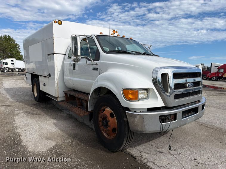 image for item YA3902 2010 Ford F750 Super Duty chipper truck