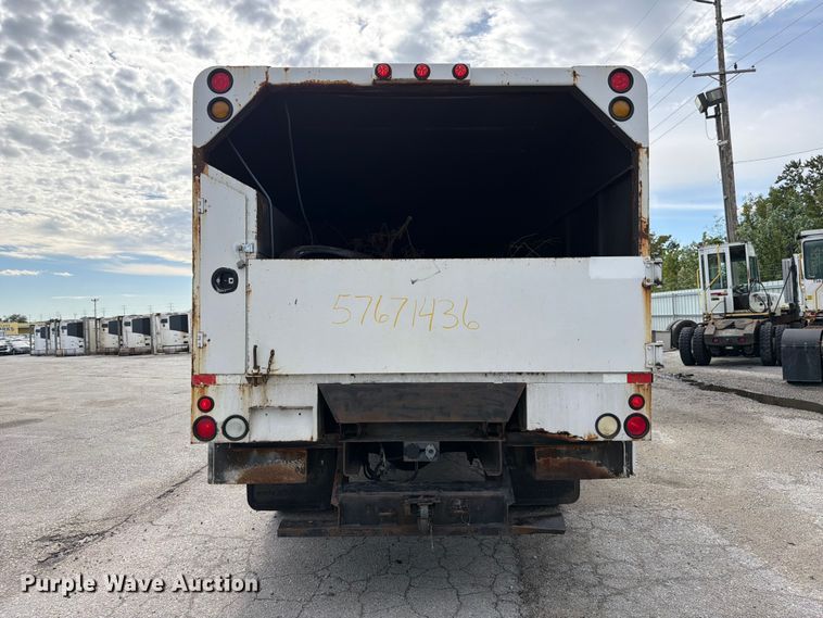image for item YA3902 2010 Ford F750 Super Duty chipper truck