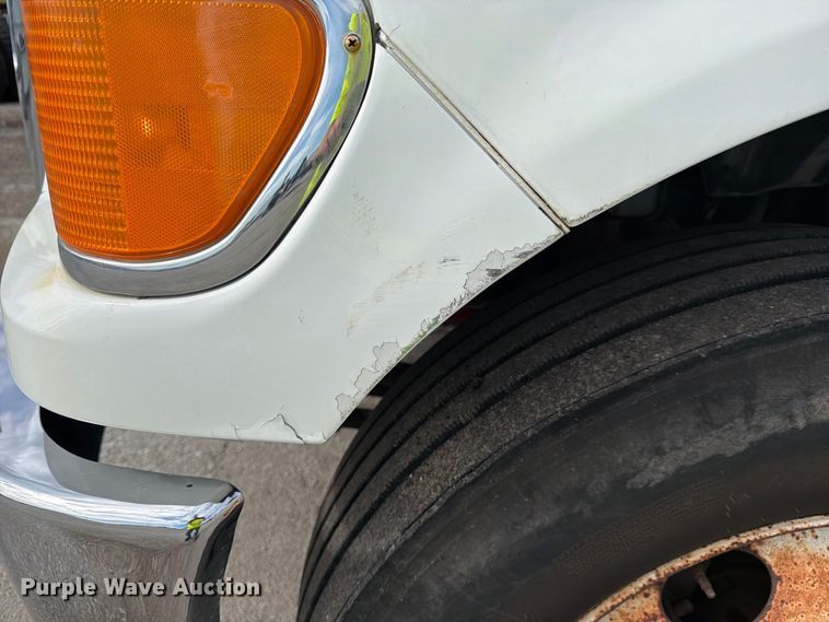 image for item YA3902 2010 Ford F750 Super Duty chipper truck