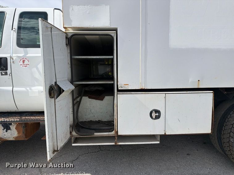 image for item YA3902 2010 Ford F750 Super Duty chipper truck