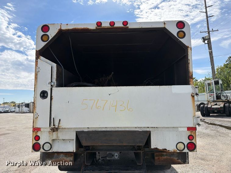 image for item YA3902 2010 Ford F750 Super Duty chipper truck