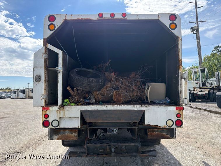 image for item YA3902 2010 Ford F750 Super Duty chipper truck