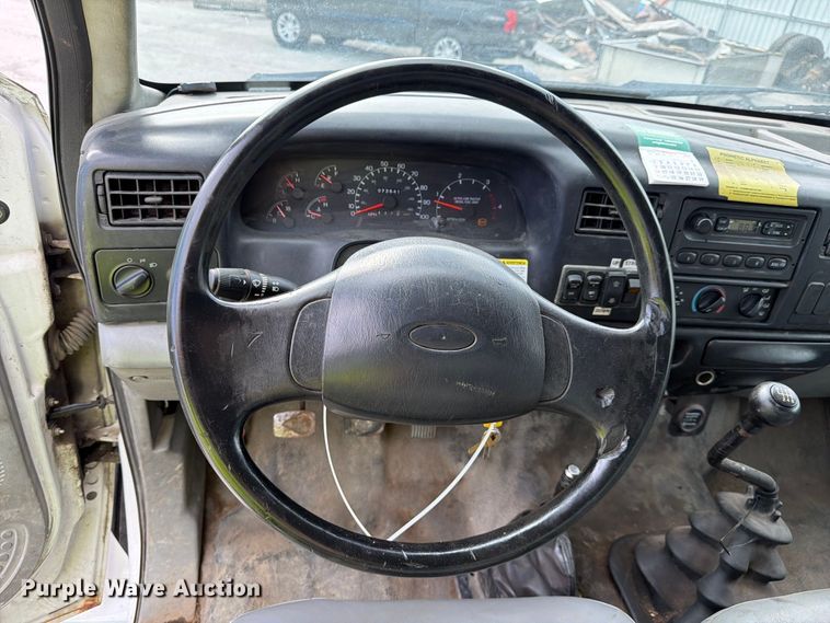 image for item YA3902 2010 Ford F750 Super Duty chipper truck