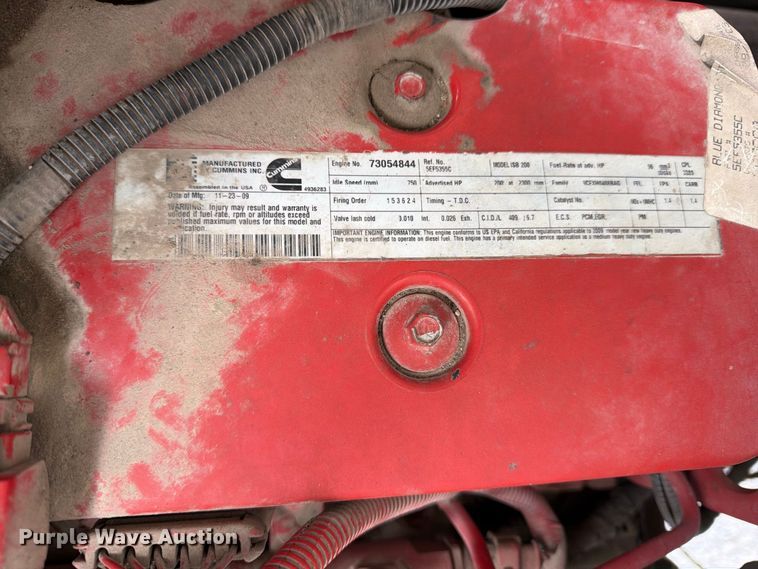 image for item YA3902 2010 Ford F750 Super Duty chipper truck