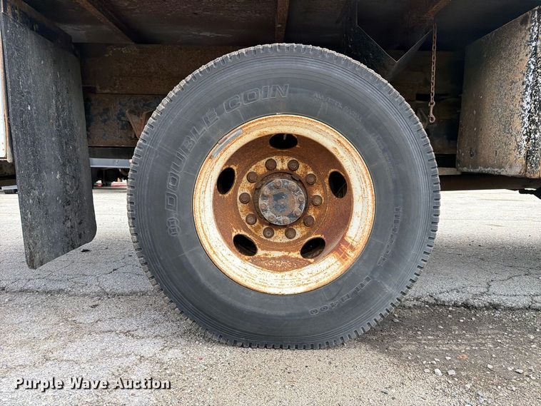 image for item YA3902 2010 Ford F750 Super Duty chipper truck
