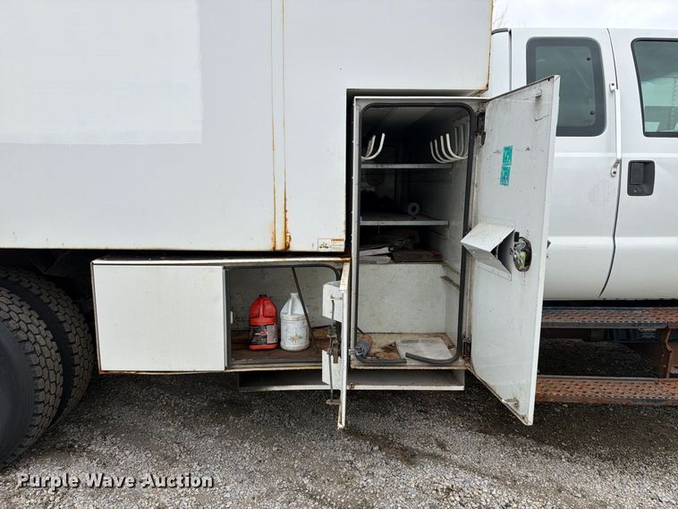 image for item YA3904 2010 Ford F750 Super Duty chipper truck